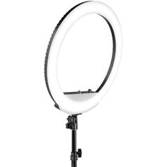 a ring light on a tripod with a white background