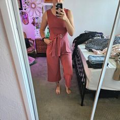 Rose Pink Colored Jumpsuit. Size Medium. Soft And Stretchy Material. Ties In The Front. Tags Still Attached. Pink Sleeveless Onesie, Pink Relaxed Fit Cotton Jumpsuit, Casual Pink One-piece Jumpsuits And Rompers, Pink Printed V-neck Jumpsuits And Rompers, Pink Floral Print V-neck Jumpsuit/romper, Colorful Jumpsuit, Pink Jumpsuit, Stretchy Material, Pink Roses