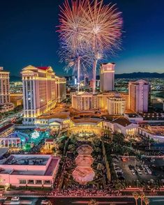 fireworks over the las vegas strip at night with hotels and casinos in the background