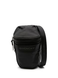 black ripstop texture grosgrain ribbon trim logo stamp to the front front zip fastening adjustable logo-jacquard shoulder strap main compartment silver-tone hardware This piece comes complete with a protective dust bag. Givenchy Backpack, Givenchy Bag, Givenchy Man, Phone Pouch, Ribbon Trim, Logo Stamp, Espadrille Shoes, Modern Man, Grosgrain Ribbon