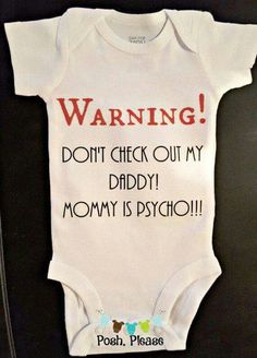 a baby's bodysuit that says warning don't check out my daddy mommy is