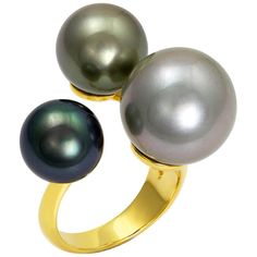 One-of-a-kind South Sea Tahitian cluster pearl ring with three different sizes (15, 12, 11 mm) of pearls in gorgeous hues of grey and rare fancy greens, handcrafted in 18 karat yellow gold. US size 6.5. This amazing cocktail ring looks like the pearls are "floating" on your fingers when worn. The elegant design is a modern take on classic pearls, but just as timeless. Black Pearl Jewelry, Tahitian Pearl Ring, Pearl Cocktail Ring, Pearl Rings, Pearl Jewels, Asian Jewelry, Bold Rings, Pave Diamond Ring, Jewels Rings