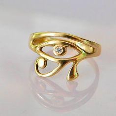 Beautifully detailed Evil eye, protection eye of Rah ring in solid gold. The Eye of Horus is an ancient Egyptian symbol of protection & power. Please allow 2 weeks for production of all orders in 14k gold and 3 to 7 days for orders in 18k gold Sizing included from size 4us to 7us DHL express worldwide shipping included. Symbolic Yellow Gold Rings For Ceremonial Occasions, Symbolic Gold Plated Rings For Anniversary, Symbolic 14k Stamped Promise Jewelry, Spiritual Gold Diamond Ring For Anniversary, Symbolic 14k Gold Diamond Ring Gift, Spiritual 14k Gold Tarnish Resistant Rings, Symbolic Gold Diamond Ring As Gift, Gold Diamond Ring Gift, Spiritual Style Yellow Gold Plated Rings