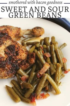 a white plate topped with meat and green beans