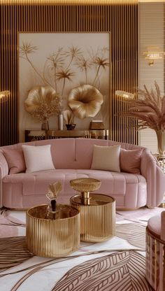 an elegant living room with pink couches and gold accents on the wall behind them