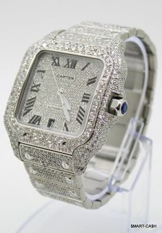 Cartier Santos Men's 40mm Large Steel Watch Roman Iced 20ct Diamonds SOLITAIRE All Diamonds are 100% Natural stones, NOT "CVD)  Total Diamond Wht: approx. 20 Karats   Type Wristwatch Brand Cartier Model Cartier Santos Dial Color Black, Silver Case Size 40 mm Reference Number WSSA0018 Water Resistance Not Water Resistant Gender Men's Year Manufactured 2010-Now Country/Region Of Manufacture Switzerland Condition Pre-owned Watch Description Cartier Cartier Santos 40 mm NEW STYLE SOLITAIRE SETTING! Condition: Pre-owned Year: 2010-Now Reference Number: WSSA0018 Water Resistance: Not Water Resistant Material: Stainless Steel With Papers: Yes With Original Boxpackaging: Yes Max Wrist Size: 6.5" Certificate: No Iced Out Cartier Watch, Cartier Watches Mens, Cartier Santos, Solitaire Setting, Best Watches For Men, Cartier Watch, Vs Diamond, Steel Watch, Diamond Solitaire