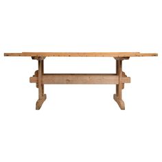 a wooden table with two legs on it