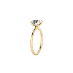 This elegant solitaire ring features lustrous metal gracefully rising like vines reaching for the sun, subtly evoking nature's beauty. The center stone is securely held by classic claw prongs, while the band gently tapers from 2mm to 1.2mm, offering a sleek and sophisticated finish. Center Stone: 2.5ct Round F/VVS2 IGI Certified Lab-Grown Diamond (included with ring) Ring Details: Width: 2.0mm Material:14k Solid Gold, choice of Yellow, White or Rose Timeless Solitaire Jewelry With Round Band, Elegant Round Cut Crystal Ring With Single Diamond, Elegant Crystal Ring With Single Diamond, Refined Moissanite Solitaire Jewelry, Elegant Gold Crystal Ring With Single Diamond, Refined Round Cut Jewelry With Tension Setting, Minimalist Yellow Gold Jewelry With Center Stone, Elegant Crystal Ring With Single Diamond For Promise, Minimalist Round Cut Crystal Ring For Formal Occasions