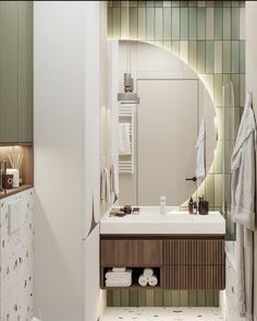 a bathroom with a sink, mirror and towel rack in the corner on the wall