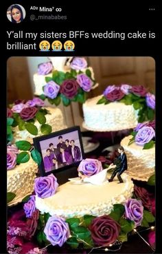 three tiered wedding cake with purple roses on it