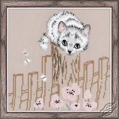 a cross stitch picture of a white cat