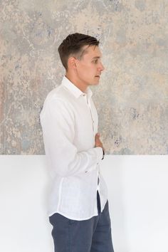 "Natural linen shirt for men with a gentle resemblance of classic men style. It's perfect for weddings and other occasions such as business meetings, birthday parties, or your significant other. This long sleeve shirt has 7 tiny coconut front buttons and could be easily suitable for all seasons and be worn as a summer/spring/fall/winter shirt - just match it with proper pants and jacket. DETAILS: - OEKO-TEX certified product (Sustainable Textile) - Your new favorite shirt - Spread collar - Butto Summer Formal Linen Shirt, White Slim Fit Dress Shirt For Summer, Classic Slim Fit Shirt For Summer, Classic Slim Fit Summer Dress Shirt, Classic Summer Dress Shirt, Slim Fit, White Summer Shirt With Button Cuffs, Slim Fit Dress Shirt For Semi-formal Summer Events, Slim Fit Dress Shirt For Semi-formal Summer Occasions, Semi-formal Summer Shirt With Button Cuffs