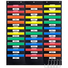 a black binder with colored labels on it and two rows of file folders