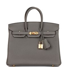 This Birkin is in Gris Meyer togo leather with gold hardware and has tonal stitching, front flap, two straps with center toggle closure, clochette with lock and two keys and double rolled handles.The interior is lined with Gris Meyer chevre and has a zip pocket with an Hermes engraved zipper pull and an open pocket on the opposite side. Collection: UOrigin: FranceCondition: Pristine; new or never (Plastic on hardware)Accompanied by: Hermes box, Hermes dustbag, clochette, lock, two keys, clochett Hermes Birkin 25, Hermes Birkin 30, Hermes Box, Togo Leather, Birkin 25, Rose Gold Hardware, Hermes Bags, Sierra Leone, Hermes Birkin