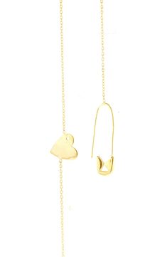 A diamond-accented heart twinkles at the bottom of a gleaming lariat necklace complete with trendy safety-pin hardware. Gold Heart Charm Lariat Necklace, Gold Lariat Necklace With Heart Charm, Gold Safety Pin Jewelry With Adjustable Chain, Valentine's Day Jewelry With Adjustable Paperclip Chain, Gold Heart-shaped Lariat Necklace With Adjustable Chain, Gold Lariat Jewelry With Heart Charm, Lariat Necklace, Safety Pin, Diamond Heart