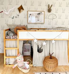 a child's bedroom with a bunk bed and toys