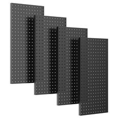 four black pegboard panels with white dots on the sides and one in the middle