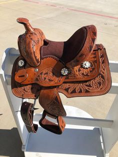 a saddle that is sitting on top of a chair