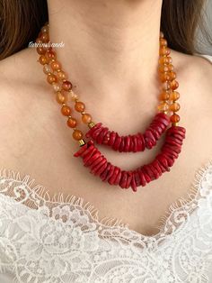 Multistrand red coral and orange agate gold plated necklace✨ All gold looking pieces are gold plated. You can wear this chic necklace every day💞 Beads: Coral stones Agate stones *Please try not to wear your jewelry while exercising, in shower or while sleeping .  *Also , is best to keep away from chemicals, lotions or strong perfumes . Cleaning them with a simple polished cloth is ideal .  FAST FREE SHIPPING! If you have any questions feel free to contact💌 Love from tarcinshands! Orange Red Coral Gemstone Beaded Necklaces, Orange Red Coral Gemstone Beaded Necklace, Red Multi-strand Necklaces With Natural Stones, Orange Gemstone Beads Necklace In Red Coral, Red Double Strand Gemstone Bead Necklaces, Handmade Red Carnelian Beaded Necklaces, Red Agate Beaded Bohemian Necklace, Red Agate Beaded Necklace With Gemstone Beads, Orange Necklace With Colorful Beads And Red Coral