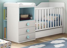 a baby's room with a crib, dresser and bed