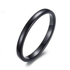 a black wedding ring on a white background