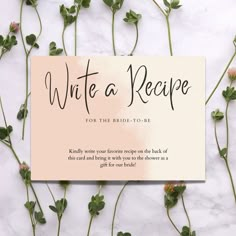 a card that says, write a recipe for the bride to be on top of some flowers