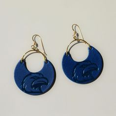 Elevate your game day look with our Blue Eagles Ninas. A cute and chic game day earring that's perfect for showing off your team spirit in style. These Blue Eagles Ninas earrings are perfect for showing off your Eagles Pride! Safety Pin Jewelry, Nickel And Suede, City Woman, Sports Jewelry, Everyday Tote, Womens Soccer, Charm Rings, Pin Jewelry, Sunglasses Shop