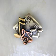 "Beautifully detailed brass stampings are soldered together to create this Brooch. A thick anti-tarnishing plate is professionally plated, oxidized to bring out the intricate detail in each piece, hand satined and lacquered to further insure this will never tarnish. No special care is required. Amazingly lightweight. The mixed metal combination of copper, silver and brass create depth, contrast and realism. Measures 1 3/4\" x 1 3/4\" Gift Boxed Thank you for visiting my shop and please come agai Gifts For Musicians, Music Teacher Gift, Music Collage, Music Teacher Gifts, Music Jewelry, Musical Notes, Cool Pins, Music Gifts, Music Teacher