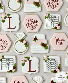 decorated cookies are arranged in the shape of hexagons with names and date