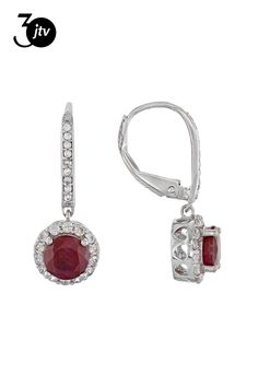 1.70ct round Indian ruby with .70ctw round white zircon rhodium silver sterling silver dangle earrings. Measure approximately 5/16"L x 1"W. Lever backings. Accent stones primarily zircon. Silver Ruby Jewelry With Pave Setting, Sterling Silver Diamond Earrings With Lever Back, Brilliant Cut Ruby Round Earrings, Classic Red Round Diamond Earrings, Ruby Round Earrings In White Gold, Red Sterling Silver Earrings With Halo Setting, Red Round Cut Jewelry With Pave Setting, Red Round Cut Pave Set Jewelry, Silver Earrings With Ruby And Diamond Accents