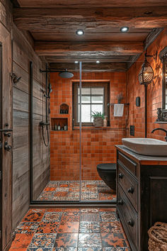 a bathroom with an orange tiled floor and wooden walls, along with a walk in shower