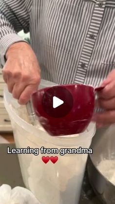 a man is mixing some food in a blender with the words learning from grandma