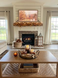 a living room filled with furniture and a fire place