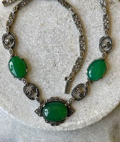 Circa 1920s Beautiful Authentic Art Deco Sterling Silver Green Chrysoprase Marcasite Vintage Antique Necklace Art Deco Jewelry Measeures aprox 17 inches around Vintage Jade Necklace For Formal Occasions, Vintage Oval Jade Necklace, Vintage Green Emerald Necklace For Formal Occasions, Victorian Oval Green Necklace, Ornate Green Oval Necklaces, Antique Green Oval Necklace, Antique Green Jade Necklace, Vintage Green Filigree Necklace, Vintage Green Jade Necklaces