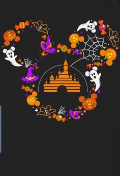 mickey mouse's castle surrounded by pumpkins, ghost and other halloween related items