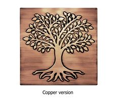 a metal plaque with a tree on it and the words copper version written in black