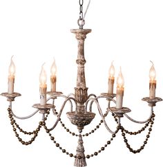 a chandelier with five lights hanging from it's sides and beads on the bottom