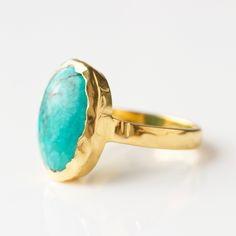 Make a statement in our molten organic turquoise ring! Each beautifully bold turquoise stone is unique, differing in shape, colour and pattern. This ancient stone is believed to bring health, good fortune and protection from evil. Read more in our guide to beautiful gemstones here  Buying a gift for someone special? Why not add the finishing touch with one of our gorgeous gift cards and gift bags? Please click here to view Wearing Rings, Molten Gold, Protection From Evil, Semi Precious Stone Bracelet, Turquoise Statement Ring, Beautiful Gemstones, Ancient Stone, Flat Back Earrings, Solid Gold Necklace