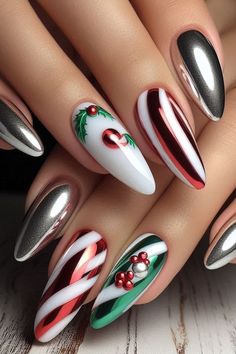 Elevate your holiday nail game with these stunning chrome accent candy cane nails! The classic red and white stripes get a modern twist with shiny chrome details, making your manicure stand out at any festive gathering. Perfect for holiday parties or a chic winter vibe, these nails are a must-try! Add some metallic flair to your holiday style! ✨🍭💅 #NailArt #CandyCaneNails #ChromeNails #HolidayNailDesigns #FestiveNails Christmas Nails With Chrome Powder, Chrome Candy Cane Nails, Christmas Nail Designs Chrome, Christmas Nails Metallic, Christmas Gel Nail Art Designs, Christmas Nails Crome, Chrome Nails Designs Winter, Christmas Metallic Nails, Nyc Nails Aesthetic