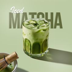 a green drink in a glass next to a whisk and wooden spoon with the words need matcha on it