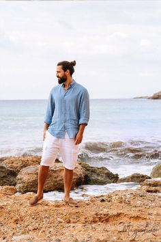 "Linen shorts in cargo style for men. Featuring an elastic drawstring waist and waistband for the desired fit, as well as two exterior pockets. A true men's wardrobe staple for hot summer days. Please note that due to the many variations in monitors and browsers, actual colors may vary Available in: white DETAILS * Model wearing white in size XL is 6'1\" (187 cm) * Regular fit. Questions about the fit? Message us! * Made from 100% European linen * Stone washed for maximum softness * OEKO-TEX cer Man Beach Photoshoot, Men’s Beach Outfits, Egypt Summer, Mens Beach Style, Mens Linen Shorts, Themed Photoshoot, Linen Clothing