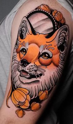 an orange cat with flowers on its head is shown in this tattoo art work by artist mark