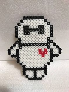 the pixel art is made with black and white beads