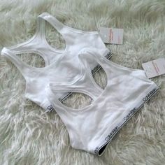 Nwt!!! Lot Of 2 Calvin Klein Modern Cotton Racerback Bralette Girls Size L Unlind Classic White 87% Cotton/ 13% Nylon Trendy Fitted Calvin Klein Tops, Fitted Trendy Calvin Klein Tops, Sporty Calvin Klein Tops For Sports, Stretch Cotton Calvin Klein Tops, Trendy Calvin Klein White Top, Trendy White Calvin Klein Top, Calvin Klein Stretch Cotton Tops, Fitted White Calvin Klein Tops, White Calvin Klein Summer Top