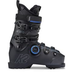 a pair of black ski boots with blue accents