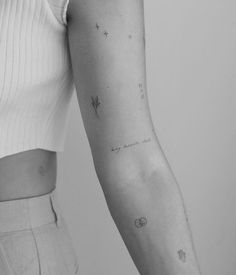 a woman's arm with stars on it