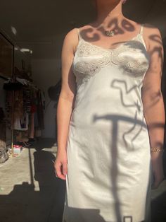 Sweet 1960s white slip dress with lace detailing at bust and hem. Spaghetti straps that are adjustable. Slips on over the head, no closures. Hits just below the knee. Slight sweetheart shaped neckline. Feels to be made of a soft nylon. * Great condition, no flaws to note Bust: 36" max Waist: 26" resting stretched to 30" Hips: 45" Length: 39" Suggested sizing: small to medium, possibly smaller large depending on bust ---- All vintage items have been described and dated to the best of my ability. Slip Dress With Lace, Lingerie Vintage, White Slip Dress, Lace Slip Dress, White Slip, Lace Slip, Satin Slip, Satin Slip Dress, Vintage Lingerie