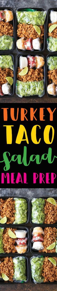 several trays of taco salad meal prepped in black plastic containers with the words turkey taco salad on them