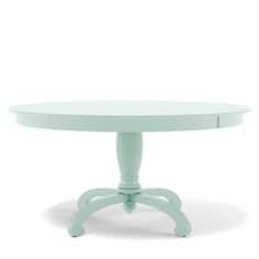 a white table with an oval shaped top