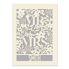 a paper cutout with the words mr and mrs in floral design on top of it